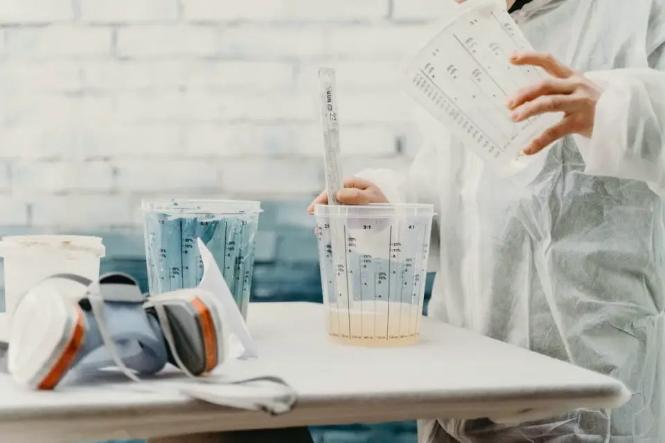 Close-up of soft chew treats being measured into a cup