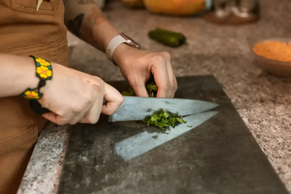Dog owner preparing a meal
