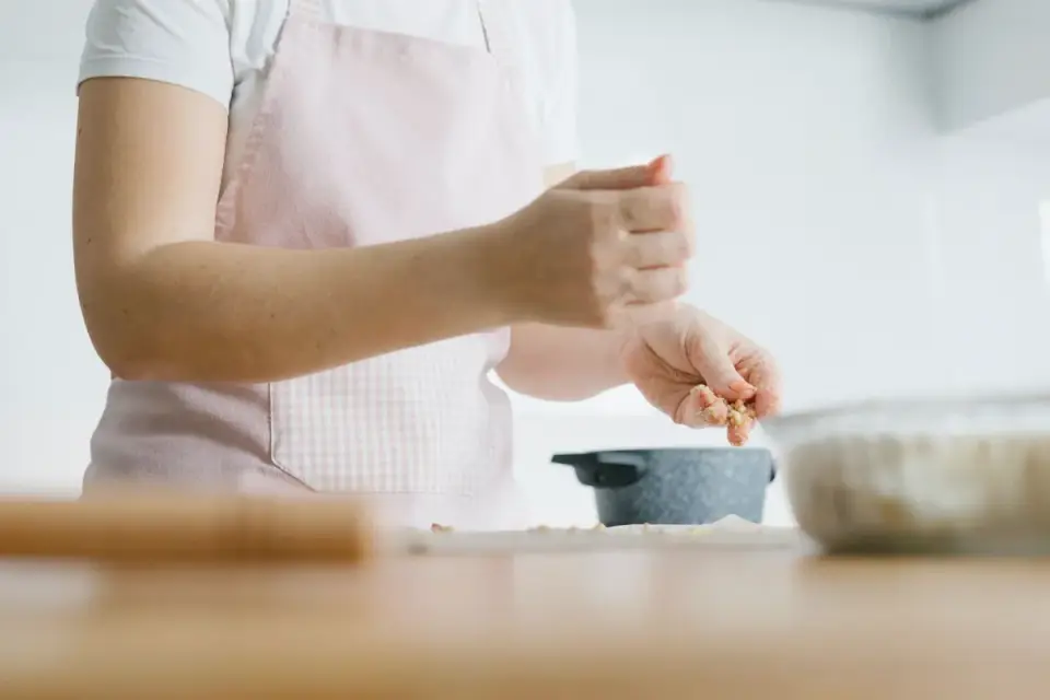 Dog owner preparing a meal